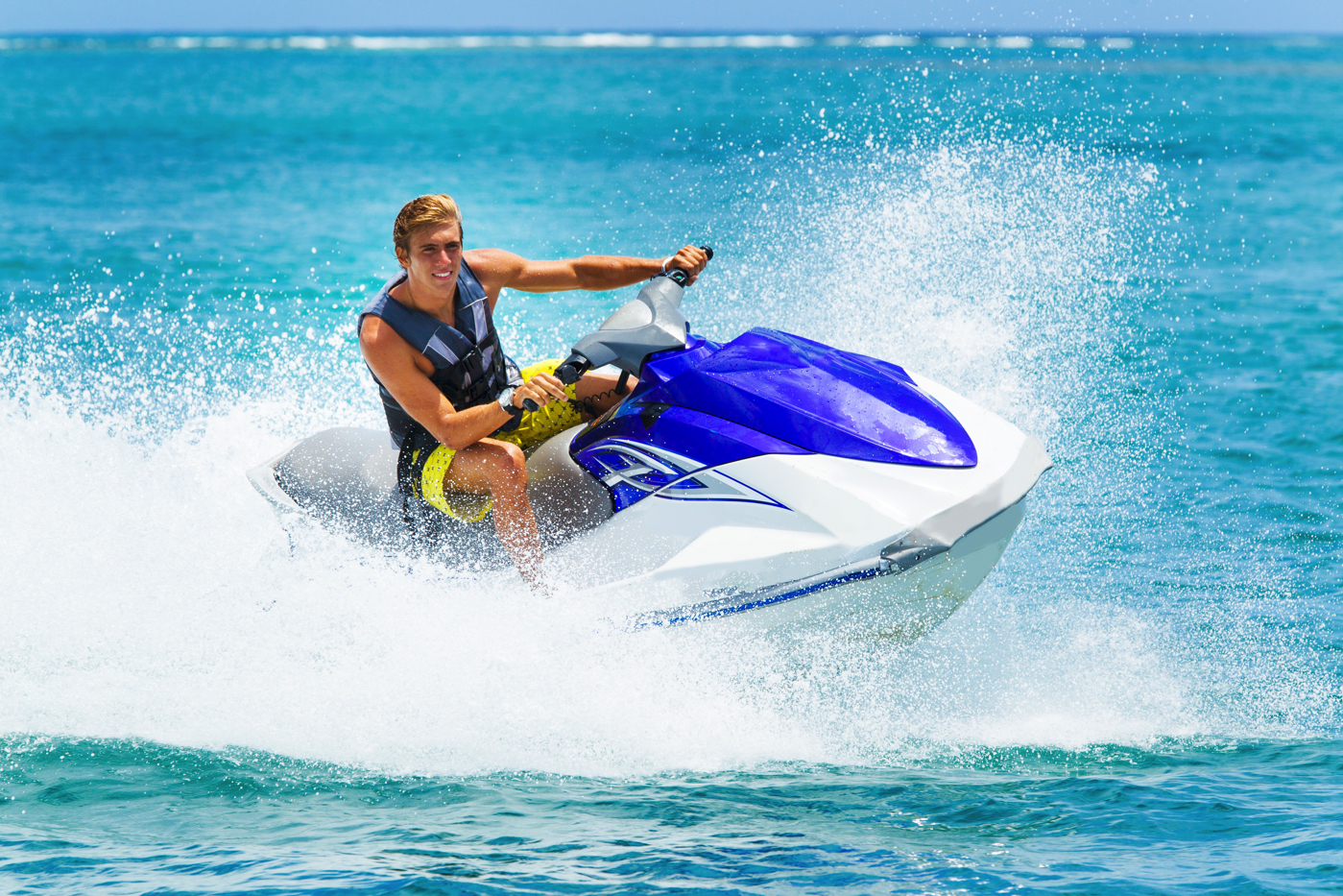 A person on a jet ski driving
