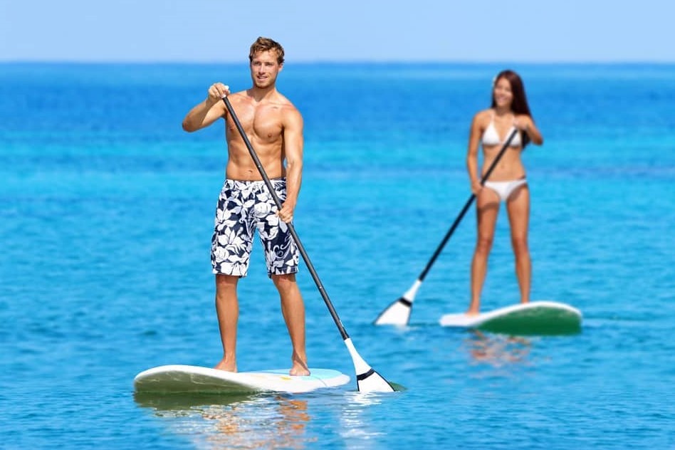 Two people on SUP boards