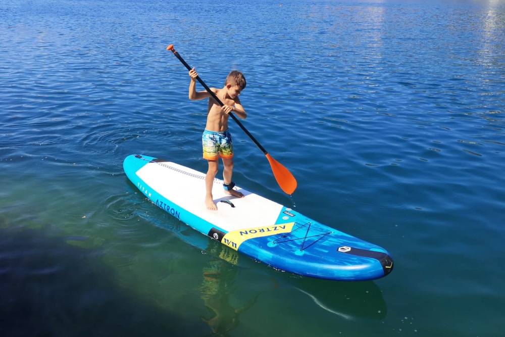 Two people on SUP boards