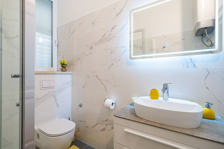 Sink and toilet in the bathroom