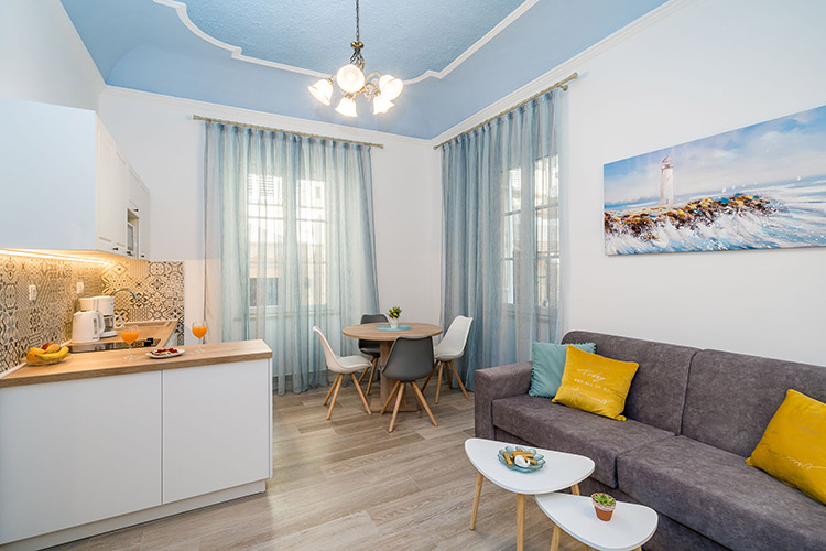 Living room with dinning area and kitchen